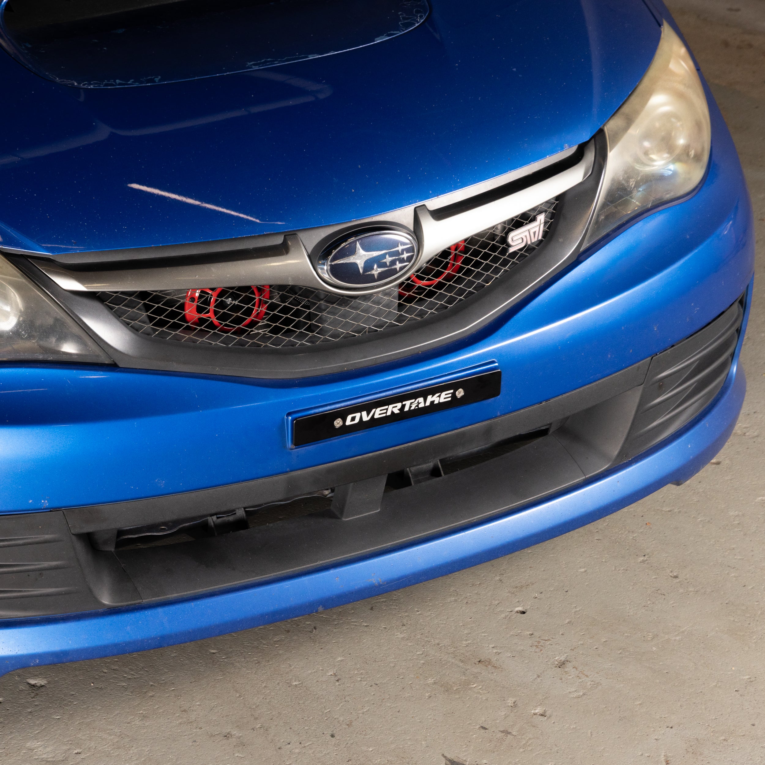 Overtake Front License Plate Delete - Universal