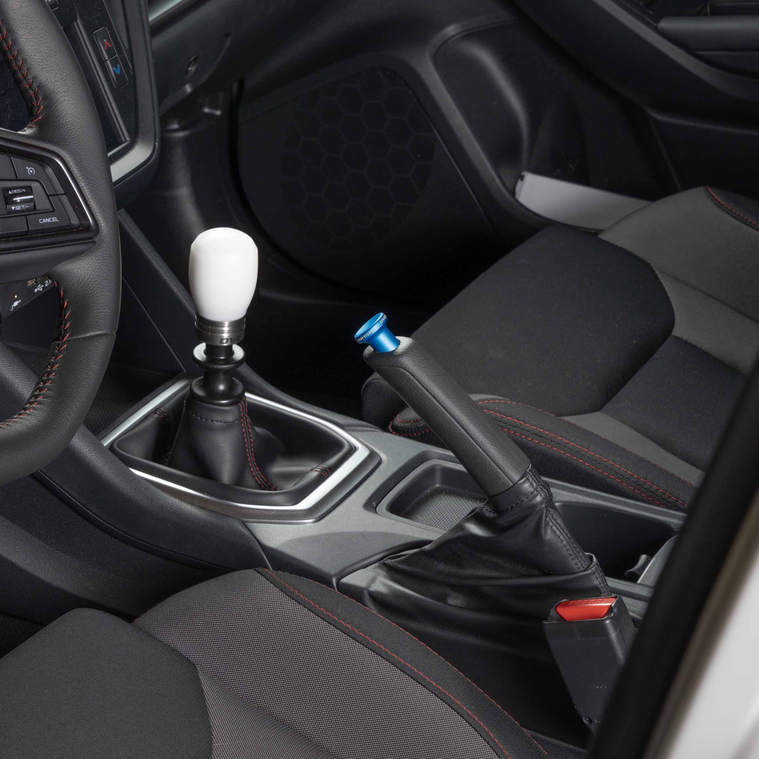 Billet aluminum drift button installed on Subaru WRX e-brake lever #color_overtake blue